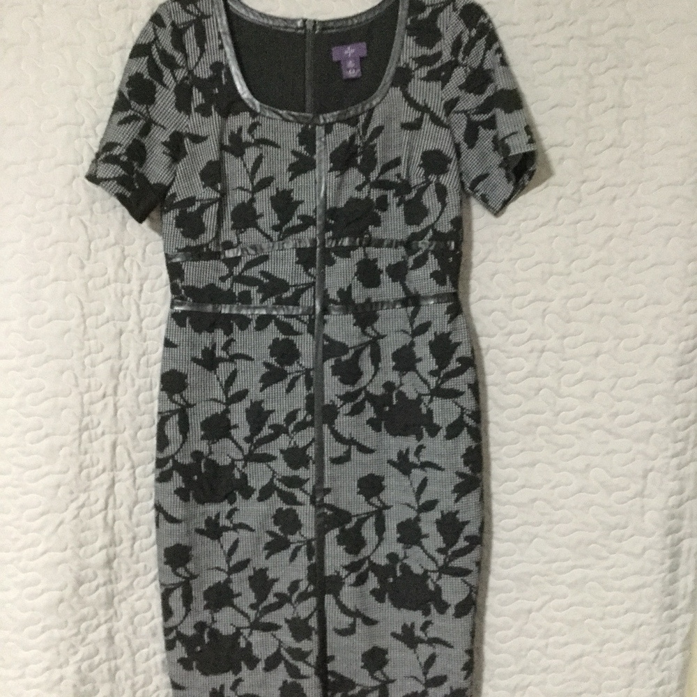 Short sleeved professional dress.